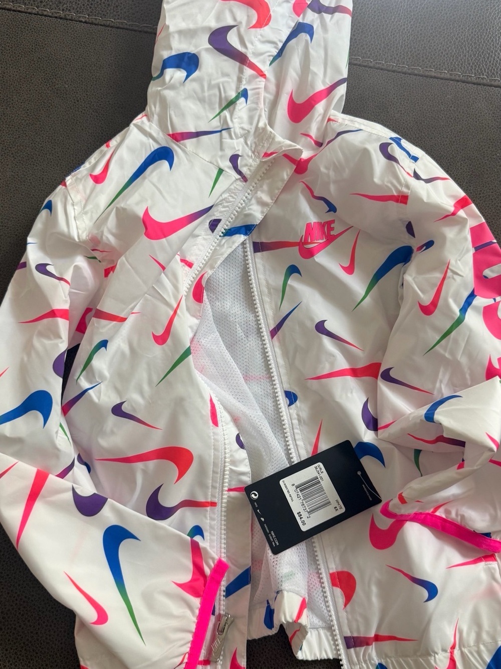 Nike White Hooded Windbreaker with Multi-Color Swoosh Print
